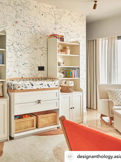 For a child's nursery, I created a wall of whimsical, hand-doodled animals. This monochrome line art, with just a hint of color in the eyes, brings a playful and imaginative story to the room.