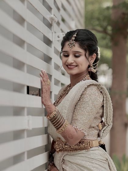 Ramya looking serene and beautiful. This shot highlights her flawless makeup and intricate hairstyle.