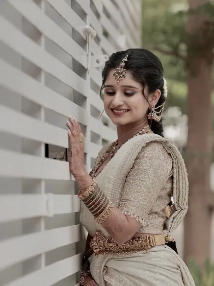 Ramya looking serene and beautiful. This shot highlights her flawless makeup and intricate hairstyle.