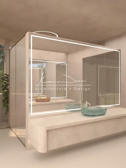 We created a sense of quiet symmetry in this bathroom by placing two basins opposite each other. The design plays with perspective and flow, while the LED-backlit mirrors add a modern touch.