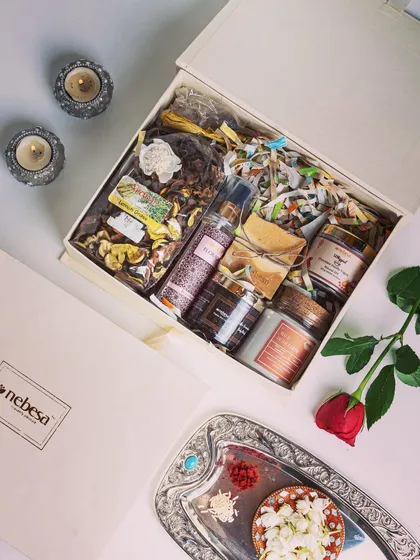 This is my "Royal Elixir" luxury hamper, perfect for Diwali. It features rich, warm scents with products like my 24k Royal Elixir butter bar, Coffee Cinnamon body polish, Wild Oudh Earth candle, and Choco Vanilla body yogurt.