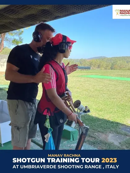A female shooter receives one-on-one coaching from Daniele Di Spigno during our training tour in Italy. We ensure every athlete gets personalized attention from world-class mentors.