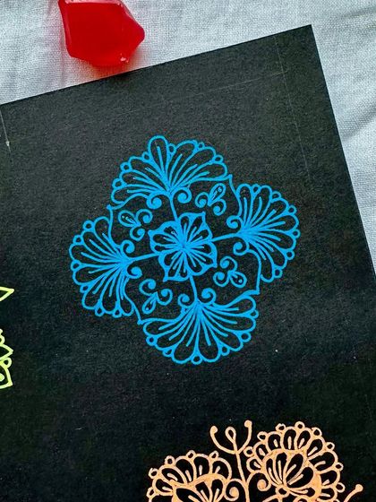 A simple yet elegant mini mandala in blue.