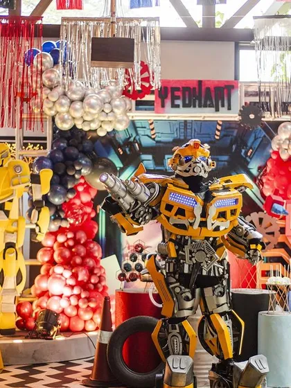 Autobots, roll out! This Transformers-themed birthday party was an action-packed celebration, complete with a life-sized Bumblebee character and industrial-style decor. I thrive on bringing these larger-than-life characters and worlds to your child's party.