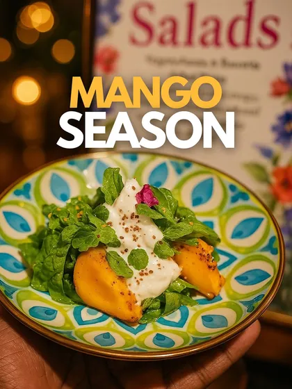 A vibrant mango salad with burrata, celebrating the best of seasonal produce.