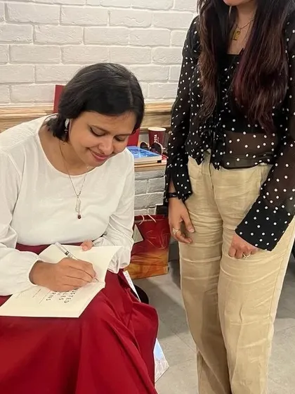 A special moment as author Smita Das Jain signs a copy of her book for a member. Getting a personalized note from the creator of a story you love is an experience we cherish.