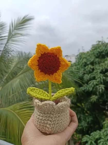 A single potted sunflower, my most popular and cheerful creation.