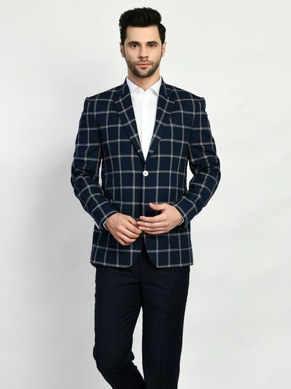 A checked blazer is a versatile staple for any professional wardrobe. I use the best fabric brands, both Indian and international, to create sartorial business suits that command respect.