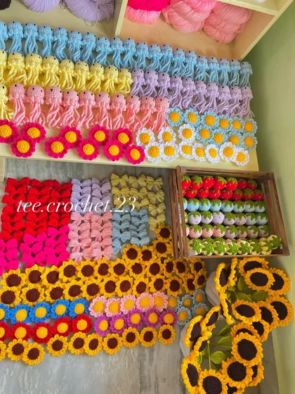 An overview of a huge keychain and amigurumi order, showing the full range of my small creations.