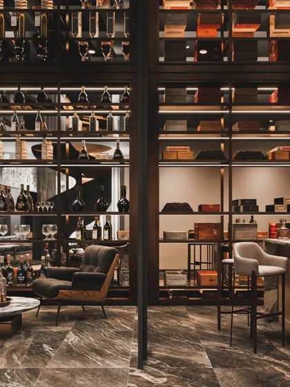This render shows a comfortable seating area within the wine cellar, creating a space for tasting and conversation.