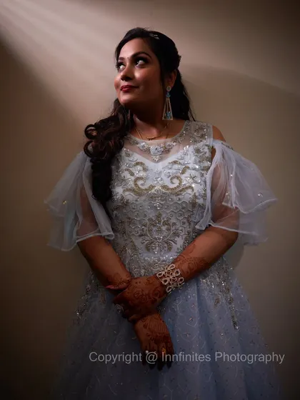 A stylized portrait of the bride-to-be, using a single light source to create a dramatic, high-fashion look. I offer these creative shots in my studio or on location.