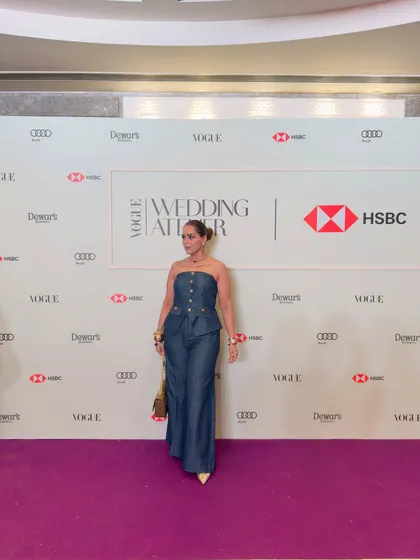 The full-length view of my denim jumpsuit look. The strapless top and wide-leg pants create a balanced silhouette that is both modern and timeless.