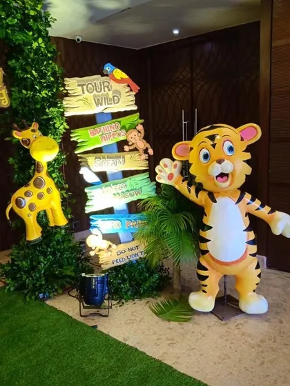 Bring your party's theme to life with our friendly character mascots. This life-sized tiger mascot is perfect for a jungle-themed birthday, greeting guests and posing for memorable photos with the kids.