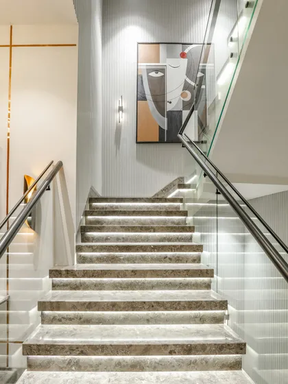 A beautifully lit staircase in our Vikaspuri residence. I used integrated LED lighting under each tread to create a floating effect, turning a functional element into a sculptural light installation.