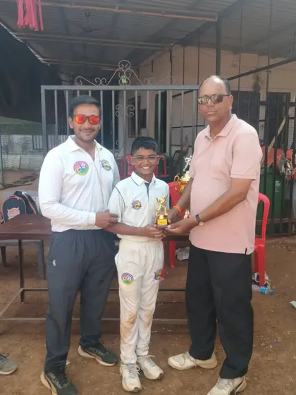 Me and another official presenting the award to Parth Rane.