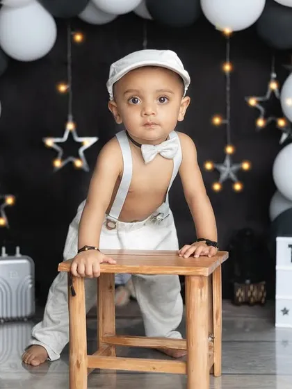 Tanush turns one! Using a lightbox is a great way to personalize the birthday setup.