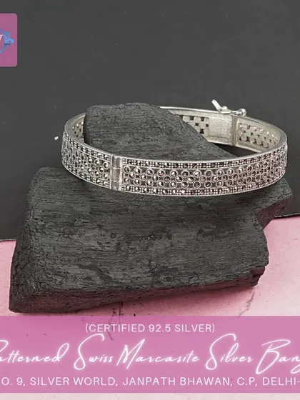 Another view of the patterned marcasite bangle, showing the secure clasp and the beautiful craftsmanship.