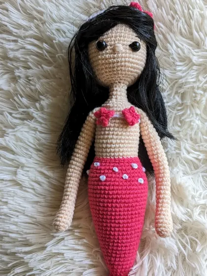 The full mermaid doll against a soft white background.