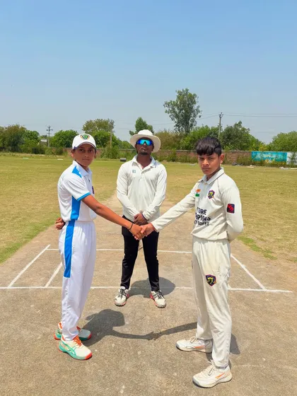 The captains shake hands at the toss, ready for a competitive match.