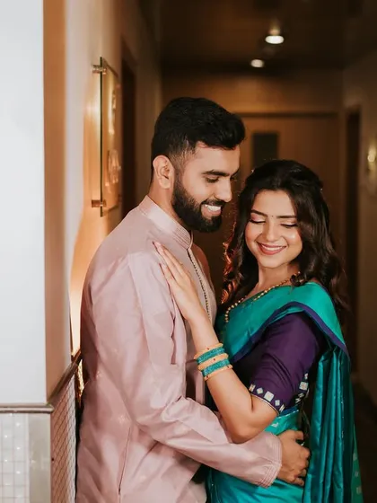 Another beautiful shot of the couple. The bride's makeup is fresh and glowing, perfect for their engagement photos.