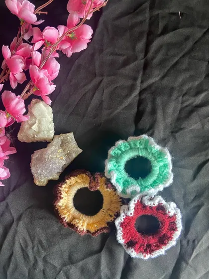 My super fluffy and ruffled crochet scrunchies. They are a perfect little add-on to complete a girly, soft aesthetic. I can make them in any color to match your outfits or my other crochet pieces.