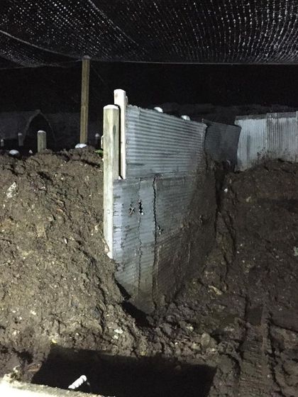 Working late at night to manage the compost bays. We quickly ran out of space, which is the central problem that led to our regulatory issues.