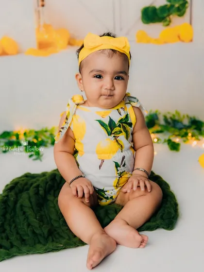 This 7-month-old cutie is the star of her lemonade-themed milestone shoot.