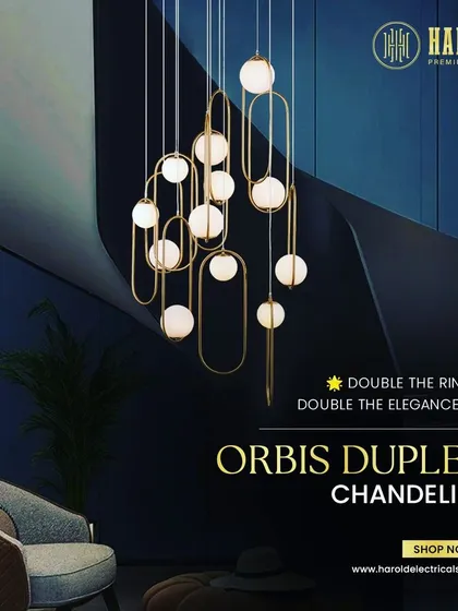 Double the rings, double the elegance. The Orbis Duplex Chandelier features interlocking rings and glowing orbs, creating a modern and sophisticated light sculpture for a duplex or grand living area.
