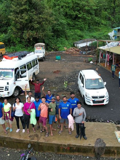 It's a wrap! The group saying goodbye, with their vehicles ready for the journey home.