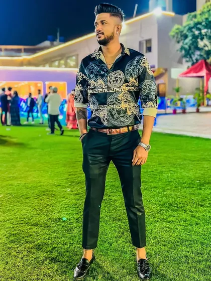 Another shot of my formal wedding attire. I ensure I look the part for your elegant celebration, ready to transition the party from formal to wild.