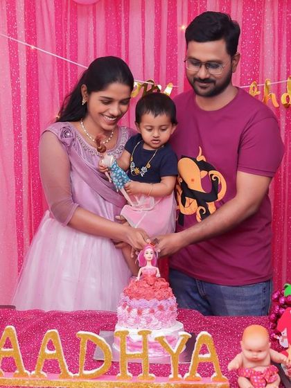 A playful 'Construction' themed birthday party, with yellow and black decor, construction vehicle cutouts, and hard hat props, perfect for little builders.