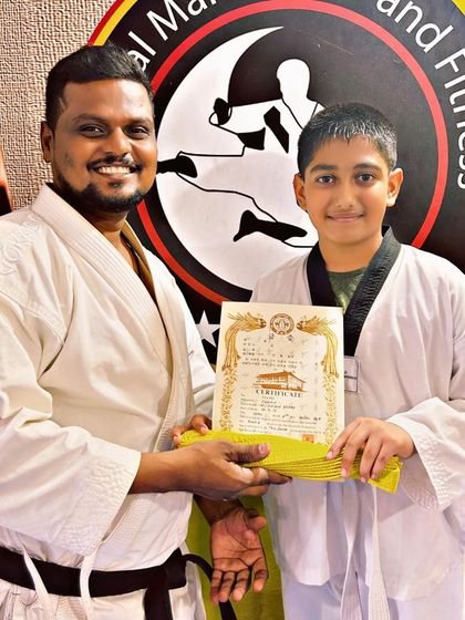 National Martial Arts and Fitness Academy - Kids Martial Arts & Fitness The Journey of Discipline: Belt Graduations photo 10