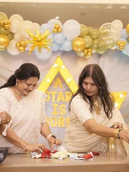 Grandparents getting involved in a flower-petal game. It’s important to me that guests of all ages feel included in the fun.