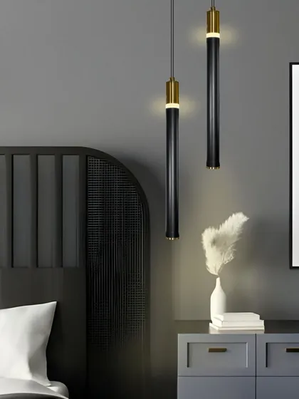 A pair of these black and gold pendants hung over a dresser or console table creates a stylish and functional vanity area.