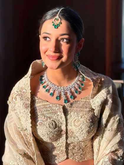 The sun-kissed glow on this masterclass model highlights the importance of creating a radiant, long-lasting base.