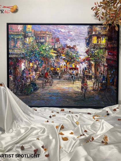 An artist spotlight on Tejinder Kanda's work, a palette-knife painting of a busy Indian street, full of movement and texture.