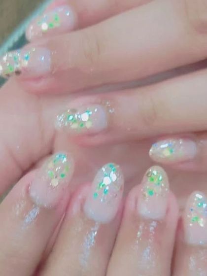 This shows how you can use glitter for a more subtle effect. I used a clear base and applied iridescent hexagonal glitter for a fun, confetti-like look.