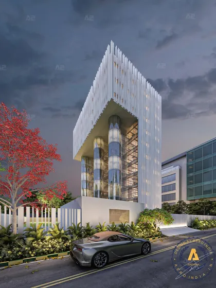 Illuminating innovation at Joy Tower, Noida. This modern commercial facade uses sleek metal and vibrant lighting to redefine the skyline with a touch of brilliance.