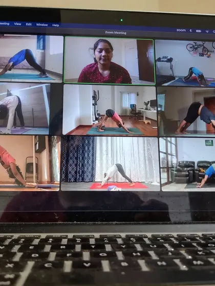 Your team can connect and practice from anywhere. This is a snapshot of one of my live virtual yoga classes on Zoom, where I guide employees through their practice at home. It's a great way to support the wellbeing of remote and hybrid teams.