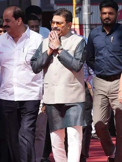 Politician Prasad Lad is pictured here in a custom waistcoat I designed for him. The two-tone design with a light grey front and dark sleeves offers a modern twist on traditional political attire.