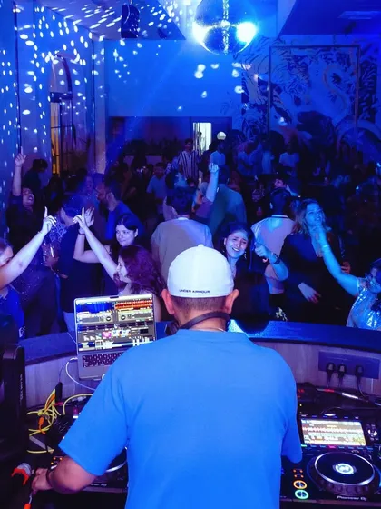 A view from my perspective, looking out at a packed and energetic dance floor.