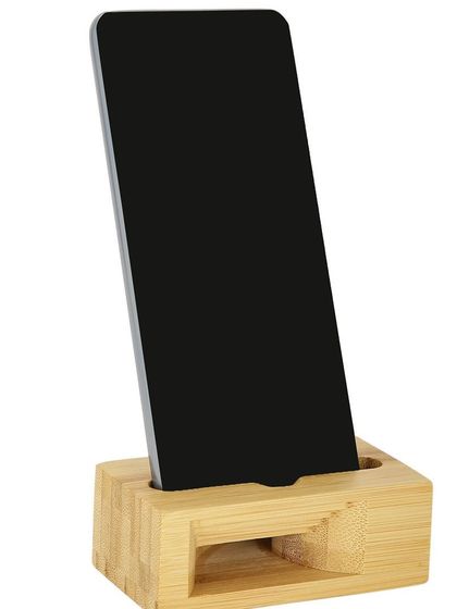 This bamboo mobile phone stand features a natural acoustic amplifier that enhances sound without electricity. It’s an innovative, eco-friendly gadget for your desk, perfect for hands-free calls or listening to music.