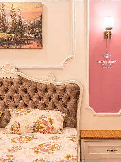 A close-up of the bed from image 89, highlighting the tufted headboard and classic wall moulding.