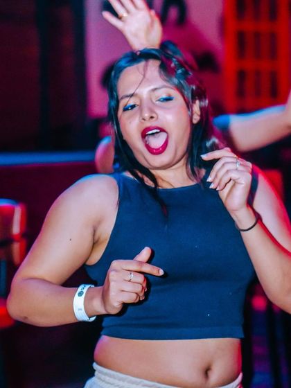 A guest singing her heart out on the dance floor. This is what I call a successful night.