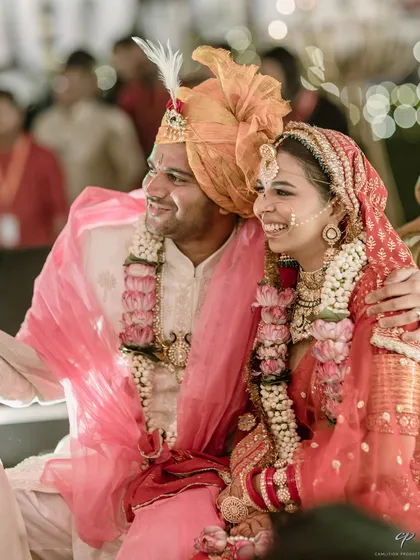 A candid shot of a couple, smiling and happy during their ceremony. These are the unposed, genuine moments of joy that truly define a wedding day.