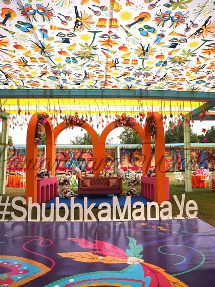 The full stage with the couple's custom hashtag, ready for a day of fun and festivities.