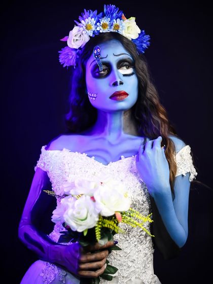 A beautiful recreation of the Corpse Bride, using body paint and character makeup techniques to capture the animated look.
