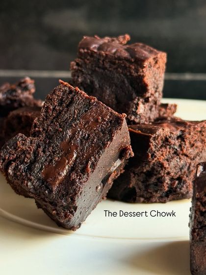 A stack of my classic chocolate brownie bites. They are perfect for sharing or for enjoying one by one whenever you need a sweet treat.