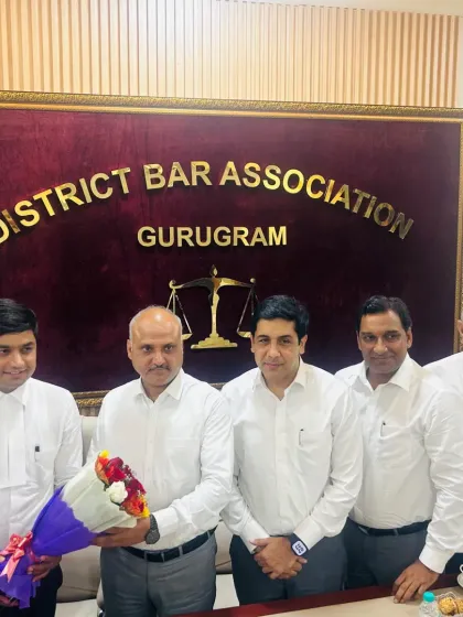Presenting a bouquet to a senior judge as a mark of respect from the entire bar association.