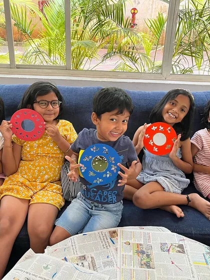 The best part of my workshops is the shared laughter and energy. Here's a happy group showing off the colourful mirror crafts they designed and decorated together during a weekend art class.